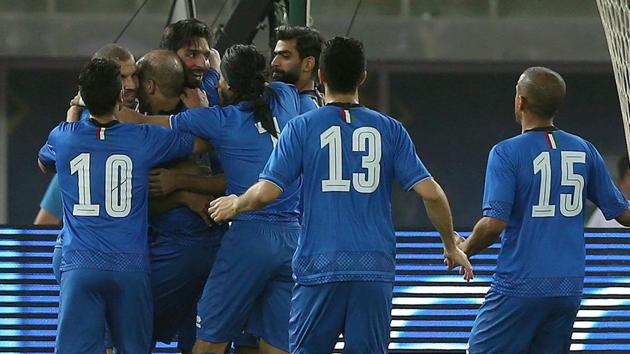 Kuwait’s Fahad Al Ansari celebrates with teammates after scoring their first goal in the FIFA World Cup warm-up match against Egypt at Jaber Al-Ahmad International Stadium, Al-Ardiya, Kuwait.(REUTERS)