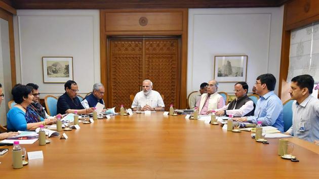 Prime Minister Narendra Modi reviews the preparations for the launch of a health scheme under Ayushman Bharat, in New Delhi.(PTI)