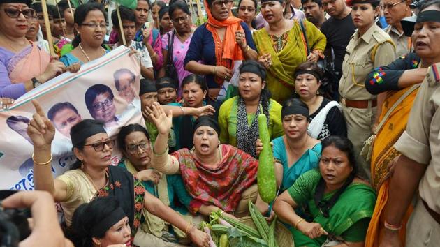 Members of Assam Pradesh Mahila Congress Committee stag a demonstration against steep hike in the prices of petrol and other essential commodities, in Guwahati on Saturday. (PTI Photo) Members of Assam Pradesh Mahila Congress Committee stag a demonstration against steep hike in the prices of petrol and other essential commodities, in Guwahati on Saturday. (PTI Photo)