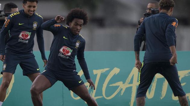 Brazil's William goes for the ball during a national football team practice session. (AP) Brazil's William goes for the ball during a national football team practice session. (AP)
