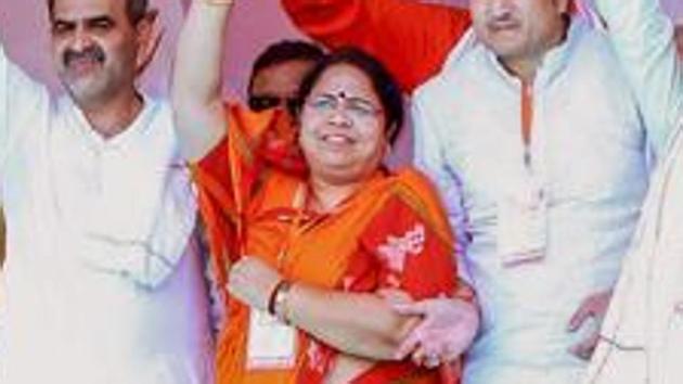 BJP Rajya Sabha MP Kanta Kardam (centre, in saree) at a rally for the party’s Kairana candidate Mriganka Singh in Shamli on May 24, 2018. The Kairana bypolls are being held on May 28.(PTI)