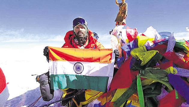 Bhagwan Chawale poses for a picture after conquering Mount Everest on May 17. (HT PHOTO) Bhagwan Chawale poses for a picture after conquering Mount Everest on May 17. (HT PHOTO)