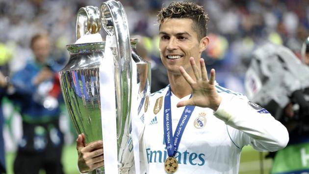 Real Madrid's Cristiano Ronaldo celebrates with the trophy after winning the Champions League final vs Liverpool at the Olimpiyskiy Stadium in Kiev on Saturday.(AP)