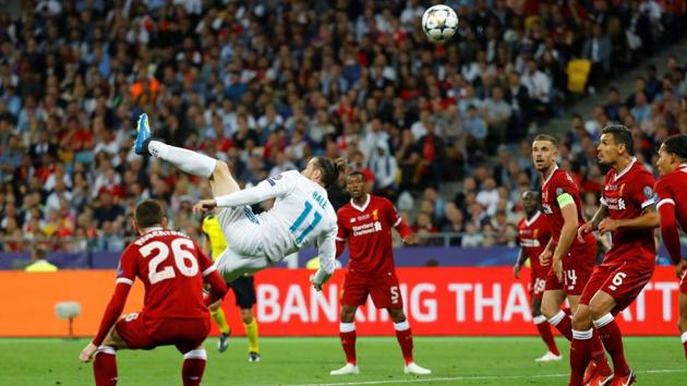Gareth Bale scores their second goal with an overhead kick (REUTERS) Gareth Bale scores their second goal with an overhead kick (REUTERS)