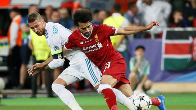 Sergio Ramos challenge on Mohammed Salah resulted in the Egyptian being substituted in the first half of Champions League final with injury. (REUTERS) Sergio Ramos challenge on Mohammed Salah resulted in the Egyptian being substituted in the first half of Champions League final with injury. (REUTERS)