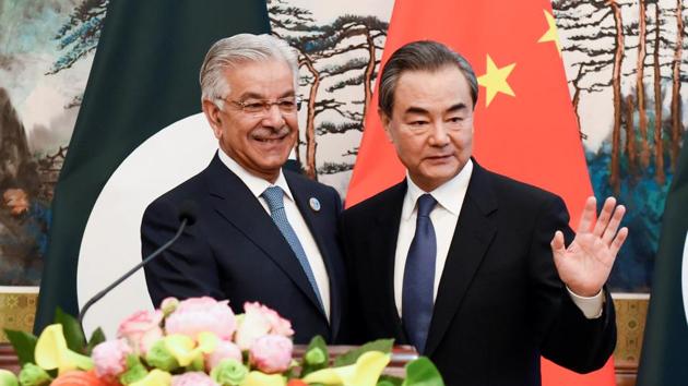 Pakistan’s Foreign Minister Khawaja Muhammad Asif and Chinese State Councilor and Foreign Minister Wang Yi at a press conference at the Diaoyutai State Guest House in Beijing, China, April 23, 2018.(Reuters File Photo) Pakistan’s Foreign Minister Khawaja Muhammad Asif and Chinese State Councilor and Foreign Minister Wang Yi at a press conference at the Diaoyutai State Guest House in Beijing, China, April 23, 2018.(Reuters File Photo)