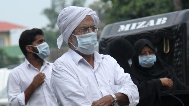 People wear safety masks as a precautionary measure after 'Nipah' virus outbreak, at Kozhikode Medical College, in Kerala.(PTI)