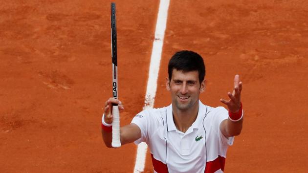 Serbia's Novak Djokovic celebrates during his first round match against Brazil's Rogerio Dutra Silva on Monday.(REUTERS)