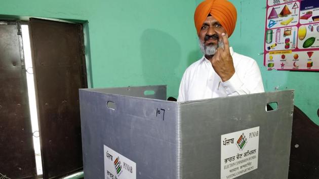 Congress candidate Hardev Singh Laddi Sherowalia at the Malsian a polling booth on Monday. (Pardeep Pandit/HT )