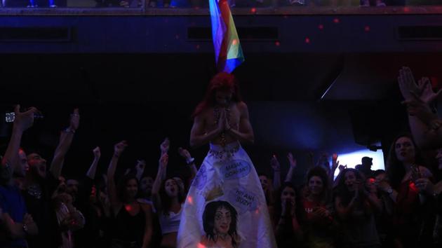 Drag queen Narcissa performs during the Pride week drag ball show, as a crowd cheers her up. Pressure has forced authorities to stay within “mainstream red lines,” said Sahar Mandour, Amnesty International’s Lebanon researcher. But security forces find other ways. Forcing Damien to sign the pledge was a new method, for example, aimed at making the cancellations seem voluntary. (Hassan Ammar / AP) Drag queen Narcissa performs during the Pride week drag ball show, as a crowd cheers her up. Pressure has forced authorities to stay within “mainstream red lines,” said Sahar Mandour, Amnesty International’s Lebanon researcher. But security forces find other ways. Forcing Damien to sign the pledge was a new method, for example, aimed at making the cancellations seem voluntary. (Hassan Ammar / AP)