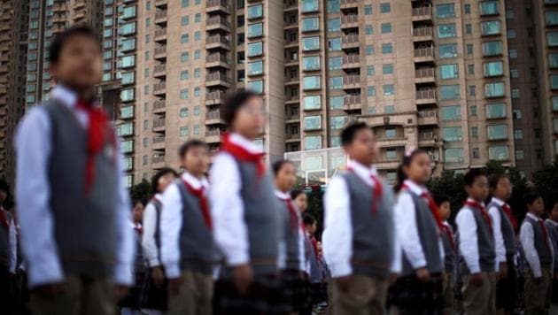 Members of Young Pioneers of China gather at the weekly flag-raising ceremony at a school in Shanghai, China. (Reuters File Photo) Members of Young Pioneers of China gather at the weekly flag-raising ceremony at a school in Shanghai, China. (Reuters File Photo)