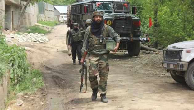 Army soldiers near the site of an encounter in southern Kashmir’s Shopian. (HT FILE PHOTO)