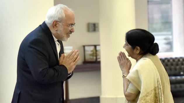 External affairs minister Sushma Swaraj greets Iran’s foreign minister Mohammad Javad Zarif in New Delhi on Monday(Sonu Mehta/HT PHOTO)