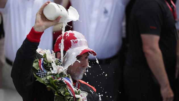 Will Power of Australia celebrates after winning the Indianapolis 500 auto race at Indianapolis Motor Speedway in Indianapolis on Sunday.(AP)