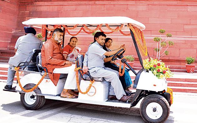 Lok Sabha Speaker Sumitra Mahajan rides an e-rickshaw in the Parliament complex. Lok Sabha Speaker Sumitra Mahajan rides an e-rickshaw in the Parliament complex.