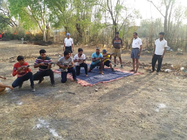 Bajrang Dal, the youth wing of Vishwa Hindu Parishad, workers being trained in Biora , Rajgarh, Madhya Pradesh to fight against alleged ‘anti-nationals and love jehadist’, which drew an angry reaction from the Congress. (HT Photo) Bajrang Dal, the youth wing of Vishwa Hindu Parishad, workers being trained in Biora , Rajgarh, Madhya Pradesh to fight against alleged ‘anti-nationals and love jehadist’, which drew an angry reaction from the Congress. (HT Photo)