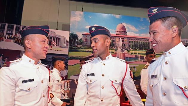 (Left to right) Cadet Ahmad Fahim Muslih, Ibrahim Sadat from Afghanistan and T Zhumanaly from Kazakhstan share a light moment during the convocation ceremony of 134th course of National Defence Academy (NDA) in Pune. (Pratham Gokhale/HT Photo)