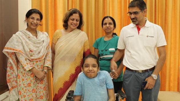 Parents and teachers of Anushka Panda celebrate after she was declared All India Topper in differently abled category by CBSE in Class 10 examination, in Gurugram on Tuesday.(HT Photo)