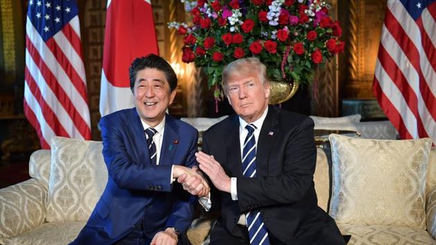 In this file photo taken on April 17, 2018, US President Donald Trump greets Japanese Prime Minister Shinzo Abe at Trump's Mar-a-Lago resort in Palm Beach, Florida. Trump and Abe agreed on May 28, 2018, that it is "imperative" to completely dismantle North Korea's nuclear weapons and ballistic missile program, the White House said. (AFP Photo) In this file photo taken on April 17, 2018, US President Donald Trump greets Japanese Prime Minister Shinzo Abe at Trump's Mar-a-Lago resort in Palm Beach, Florida. Trump and Abe agreed on May 28, 2018, that it is "imperative" to completely dismantle North Korea's nuclear weapons and ballistic missile program, the White House said. (AFP Photo)
