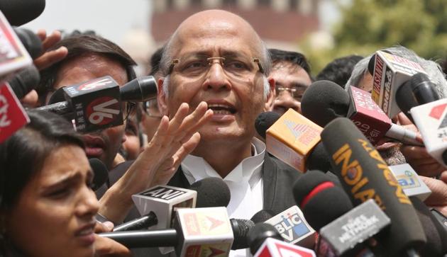 Senior Congress leader and lawyer Abhishek Manu Singhvi speaks to media personnel after a court hearing on Karnataka issue, outside Supreme Court in New Delhi, May 18(HT Photo/HT PHOTO)