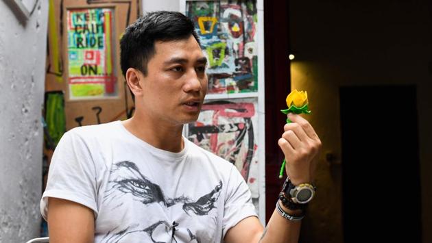 Vietnamese artist Thinh Nguyen displays an intricately crafted flower made by an inmate. Details about prison conditions are scarce and media access heavily restricted. But the law requires death row inmates to be held in solitary confinement and monitored. In letters to his family, Chuong said he was tortured in custody: hung upside down and naked with a dirty sock in his mouth, electrocuted and beaten during interrogation. (Nhac Nguyen / AFP) Vietnamese artist Thinh Nguyen displays an intricately crafted flower made by an inmate. Details about prison conditions are scarce and media access heavily restricted. But the law requires death row inmates to be held in solitary confinement and monitored. In letters to his family, Chuong said he was tortured in custody: hung upside down and naked with a dirty sock in his mouth, electrocuted and beaten during interrogation. (Nhac Nguyen / AFP)