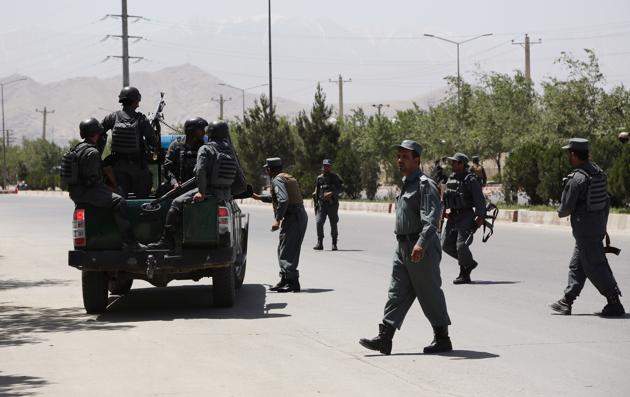 Security personnel arrive at the site of an attack in the Afghan Interior Ministry in Kabul, Afghanistan, Wednesday, May 30, 2018. (AP) Security personnel arrive at the site of an attack in the Afghan Interior Ministry in Kabul, Afghanistan, Wednesday, May 30, 2018. (AP)