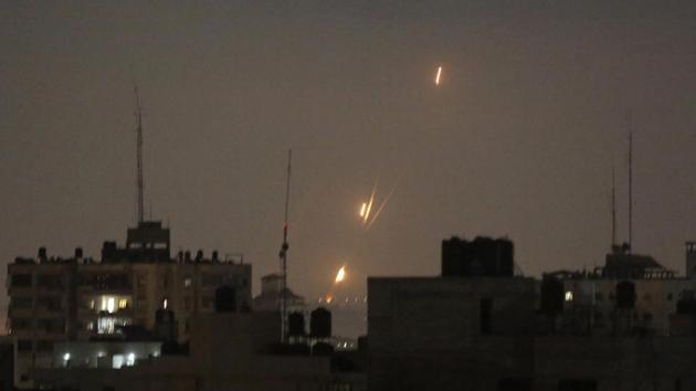 Flames of rockets fired by Palestinian militants are seen over Gaza Strip toward Israeli lands on May 30, 2018. (AP) Flames of rockets fired by Palestinian militants are seen over Gaza Strip toward Israeli lands on May 30, 2018. (AP)