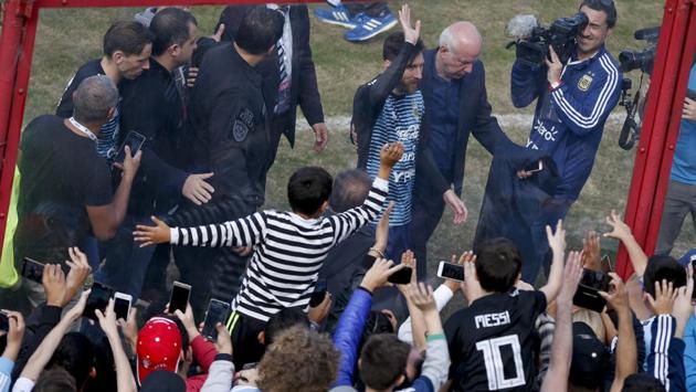 Lionel Messi even interacted with some fans in between training. (AP) Lionel Messi even interacted with some fans in between training. (AP)