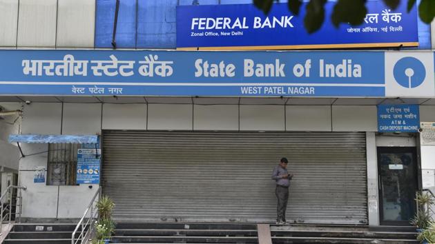 A closed branch of the State Bank of India (SBI) during the bank employees’ two-day nationwide strike for wage revision, at Patel Nagar in New Delhi on Wednesday, May 30. (Sanchit Khanna/HT Photo) A closed branch of the State Bank of India (SBI) during the bank employees’ two-day nationwide strike for wage revision, at Patel Nagar in New Delhi on Wednesday, May 30. (Sanchit Khanna/HT Photo)
