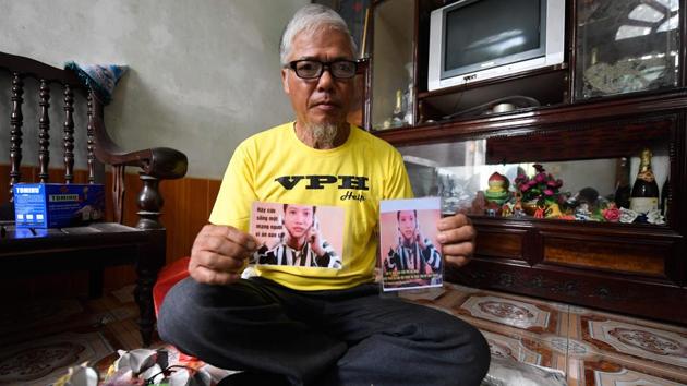 Nguyen Truong Chinh displaying portraits of his son and death row inmate Nguyen Van Chuong during an interview with AFP at his home in Hai Duong.(AFP) Nguyen Truong Chinh displaying portraits of his son and death row inmate Nguyen Van Chuong during an interview with AFP at his home in Hai Duong.(AFP)