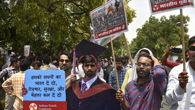 Members of the Indian Youth Congress (IYC) staged a ‘Bharat Bachao Jan Andolan’ protest against the NDA government today in New Delhi. (PTI) 