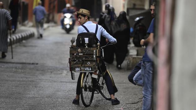 While he dreams of opening his own shop, Abo Tawila insists he’ll stay loyal to his bike. “If I open a salon, I’ll still keep it, because that’s what got me here,” he said. (Joseph Eid / AFP) While he dreams of opening his own shop, Abo Tawila insists he’ll stay loyal to his bike. “If I open a salon, I’ll still keep it, because that’s what got me here,” he said. (Joseph Eid / AFP)