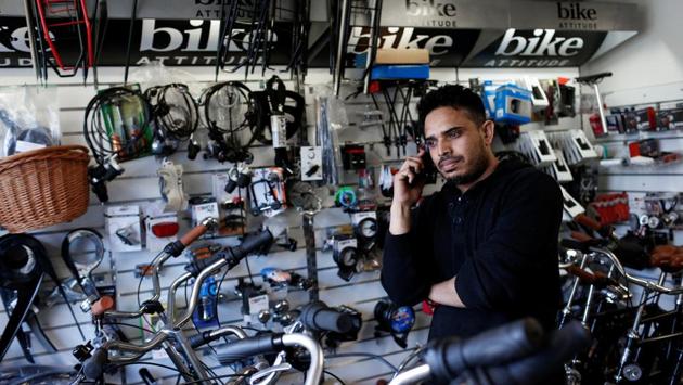 John Khan, originally from Pakistan and now a resident in Mjolnerparken, takes a telephone call in his bicycle shop, Alaska Cykler in Copenhagen. The plan has met with a mixed response in Mjolnerparken, one of the country’s 25 ghettos - a term that originated in 16th-century Venice and was used to describe areas of the city to which Jews were restricted. (Andrew Kelly / REUTERS) John Khan, originally from Pakistan and now a resident in Mjolnerparken, takes a telephone call in his bicycle shop, Alaska Cykler in Copenhagen. The plan has met with a mixed response in Mjolnerparken, one of the country’s 25 ghettos - a term that originated in 16th-century Venice and was used to describe areas of the city to which Jews were restricted. (Andrew Kelly / REUTERS)