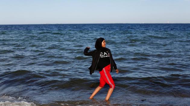 Ibtisam Ashur, plays during an excursion to the seaside with “Sjakket”, a youth group that provides activities and support for children that live in socially vulnerable areas. “The official description makes the kids associate themselves with a life of crime and fast money,” said Iranian-born Khosrow Bayet, the leader of Sjakket. (Andrew Kelly / REUTERS) Ibtisam Ashur, plays during an excursion to the seaside with “Sjakket”, a youth group that provides activities and support for children that live in socially vulnerable areas. “The official description makes the kids associate themselves with a life of crime and fast money,” said Iranian-born Khosrow Bayet, the leader of Sjakket. (Andrew Kelly / REUTERS)