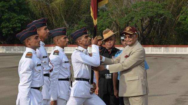 President Ram Nath Kovind presents flag to a cadet during the 'Passing out Parade' of 34th Course of National Defence Academy (NDA) in Pune. (Press TRUST OF INDIA)