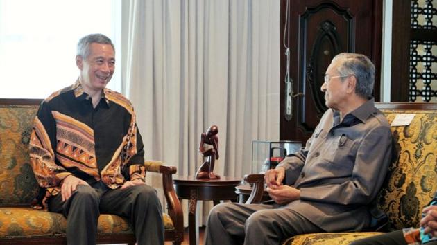 Malaysia's Prime Minister Mahathir Mohamad with Singapore's Prime Minister Lee Hsien Loong at the Perdana Leadership Foundation in Putrajaya, Malaysia on May 19, 2018 in this handout photo. Malaysia’s PM said his government planned to develop some offshore rocks which were the subject of a territorial dispute with Singapore.(Reuters Photo) Malaysia's Prime Minister Mahathir Mohamad with Singapore's Prime Minister Lee Hsien Loong at the Perdana Leadership Foundation in Putrajaya, Malaysia on May 19, 2018 in this handout photo. Malaysia’s PM said his government planned to develop some offshore rocks which were the subject of a territorial dispute with Singapore.(Reuters Photo)