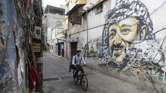 “It’s a beautiful idea because it’s a really old one,” said the dapper 18-year-old as he made his way through the district of Burj al-Barajneh. “People like this, and I love everything old. If I ever have the chance to open a barbershop, it’ll be a vintage one,” he said. (Joseph Eid / AFP) “It’s a beautiful idea because it’s a really old one,” said the dapper 18-year-old as he made his way through the district of Burj al-Barajneh. “People like this, and I love everything old. If I ever have the chance to open a barbershop, it’ll be a vintage one,” he said. (Joseph Eid / AFP)