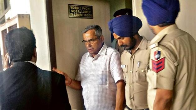 Former BSF DIG KS Padhi, who was convicted in the sex scandal, at the district courts in Chandigarh on Wednesday.(HT Photo)