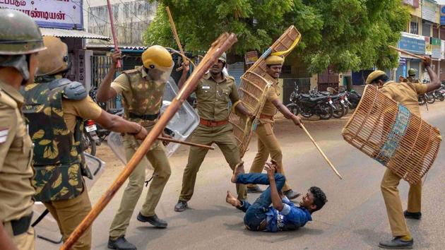 Police personnel baton charge a protestor demanding the closure of Sterlite Copper plant unit in Tuticorin, May 23, 2018.(PTI Photo) Police personnel baton charge a protestor demanding the closure of Sterlite Copper plant unit in Tuticorin, May 23, 2018.(PTI Photo)