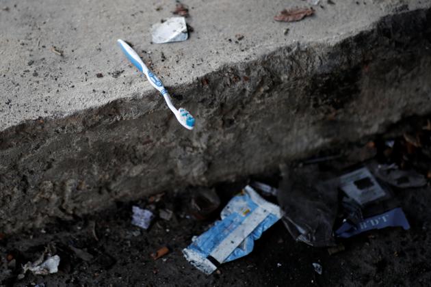 A toothbrush is seen on the ground near tents after the evacuation. Two other makeshift camps in Paris holding some 1,000 migrants are expected to be cleared next week. “To stay one month here is very, very, very bad for me. All the people have sicknesses and don’t have food,” said Farouk Ahmed from Sudan. (Benoit Tessier / REUTERS) A toothbrush is seen on the ground near tents after the evacuation. Two other makeshift camps in Paris holding some 1,000 migrants are expected to be cleared next week. “To stay one month here is very, very, very bad for me. All the people have sicknesses and don’t have food,” said Farouk Ahmed from Sudan. (Benoit Tessier / REUTERS)