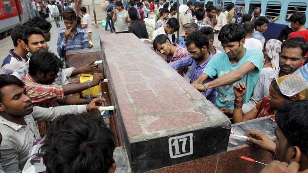 Passengers drinking water on the platform at a railway station as temperatures continue to soar, in Allahabad. (PTI File Photo) Passengers drinking water on the platform at a railway station as temperatures continue to soar, in Allahabad. (PTI File Photo)