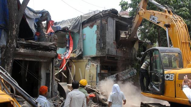 Acting on the orders of the town and country planning , district town planner officials demolished more than 50 unauthorised structures in four hours.(File photo) Acting on the orders of the town and country planning , district town planner officials demolished more than 50 unauthorised structures in four hours.(File photo)
