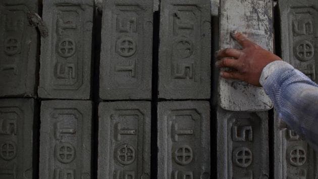 Environmental changes are positive but conditions for workers have not improved. Bonded labour traps them in spiralling debt. Sold between landlords debt starts with the sum they are bought for, growing as they borrow for food, medical care and even the bricks for their homes. (Gopen Rai / AFP) 