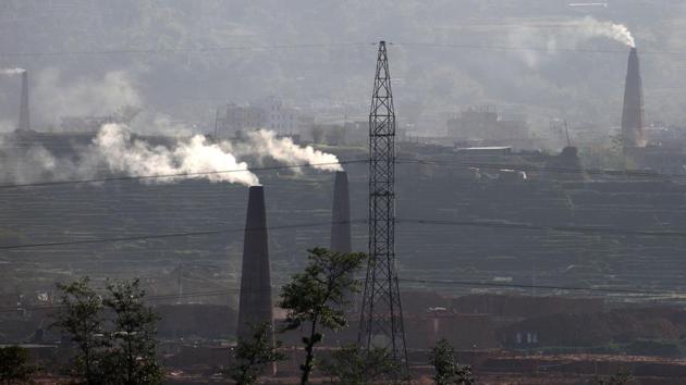 Most of the 100 brick kilns in the Kathmandu valley have already adopted the new technology. The next step is to spread the technology into elsewhere into South Asia. “We had to rebuild, so we thought why not build a more scientific, environmentally friendly structure,” said kiln owner Raj Kumar Lakhemaru. “Now there is no black smoke. The bricks are better and I am spending a lot less on coal.” (Gopen Rai / AFP) 