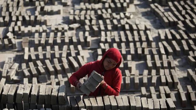 About a third of Nepal’s brick kilns were flattened by the 7.8-magnitude earthquake in 2015. But despite the scale of the tragedy, the devastation presented environmentalists a rare chance to clean up at least one part of this notoriously filthy industry. Although, brick kiln owners remain resistant to interference from labour rights groups, they saw potential profit in working with environmental campaigners. (Gopen Rai / AFP) 