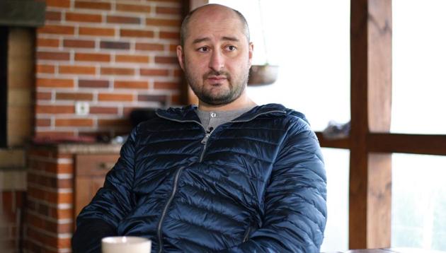Russian journalist Arkady Babchenko (pictured) said he was taken away in an ambulance from the scene of his faked murder to a morgue, where he changed clothes and began watching the news. (AFP/File Photo) Russian journalist Arkady Babchenko (pictured) said he was taken away in an ambulance from the scene of his faked murder to a morgue, where he changed clothes and began watching the news. (AFP/File Photo)