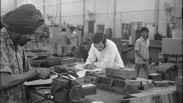 Maruti’s 300 acre manufacturing unit in what was then land under rural villages in proximity with the national capital laid the seeds of industry. Soon allied part makers also began setting units in Maruti’s vicinity and an industrial city began to take shape. (Babu Ram / HT Archive)