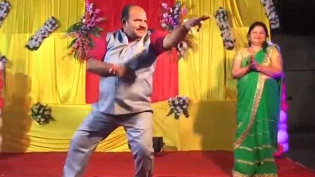 Sanjeev Shrivastava dances at a wedding in Gwalior on May 12. A stranger recorded Shrivastava’s moves, making him an internet sensation.(WhatsApp video grab)