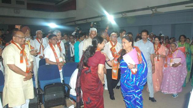 CM Vasundhara Raje greets party members and MLA's at a meeting at party office in Jaipur on Friday.(HT PHOTO)