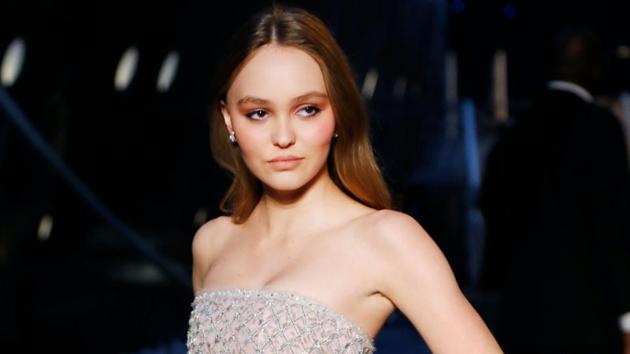French-US Model and actor Lily-Rose Depp poses during a photocall before the Chanel Croisiere (Cruise) fashion show.(AFP)